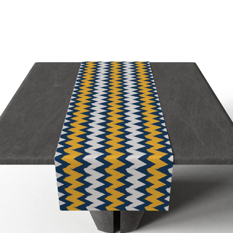 June Zigzag Velvet Table Runner, a Plush Multicolor 35x140 cm Decorative Centerpiece with a Chic and Lively Chevron Design, combines a Classic Pattern with a Luxurious Feel