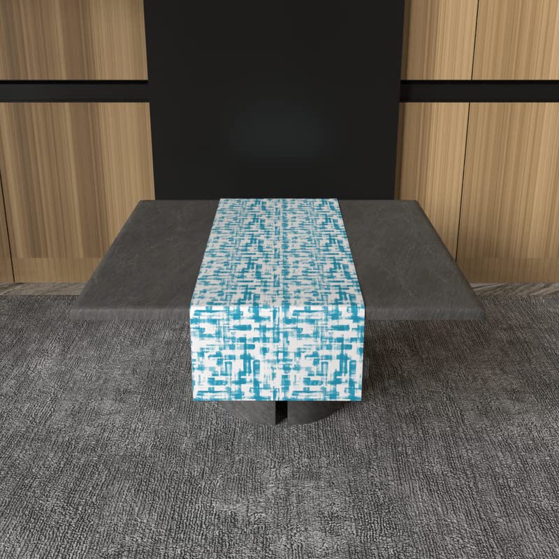 مفرش طاولة مخملي من إيزي باللونين الفيروزي والأزرق، قطعة مركزية مزخرفة من القطيفة مقاس 35×140 سم بتصميم عصري أنيق ومنعش، يوفر ملمسًا ناعمًا مع جمالية ساحلية واضحة.