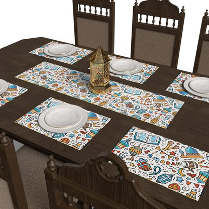 طقم أوروس لمفارش الطعام، مكون من 7 قطع، مع 6 مفارش طعام قماشية متعددة الألوان (45×30 سم) و1 مفرش (35×140 سم)، بتصميم إسلامي فني فريد من نوعه لتقديم طعام نابض بالحياة.