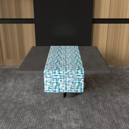 مفرش طاولة مخملي من إيزي باللونين الفيروزي والأزرق، قطعة مركزية مزخرفة من القطيفة مقاس 35×140 سم بتصميم عصري أنيق ومنعش، يوفر ملمسًا ناعمًا مع جمالية ساحلية واضحة.