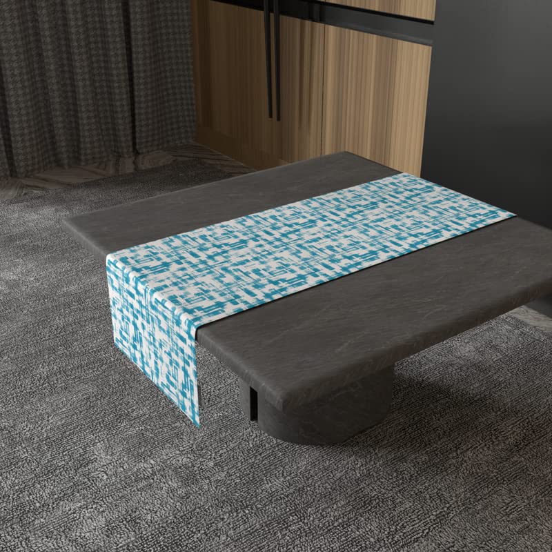 مفرش طاولة مخملي من إيزي باللونين الفيروزي والأزرق، قطعة مركزية مزخرفة من القطيفة مقاس 35×140 سم بتصميم عصري أنيق ومنعش، يوفر ملمسًا ناعمًا مع جمالية ساحلية واضحة.